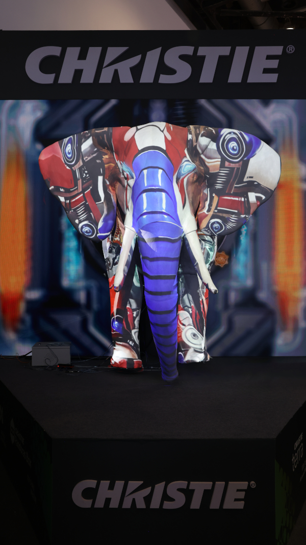 A front view of a projection mapped animatronic elephant.